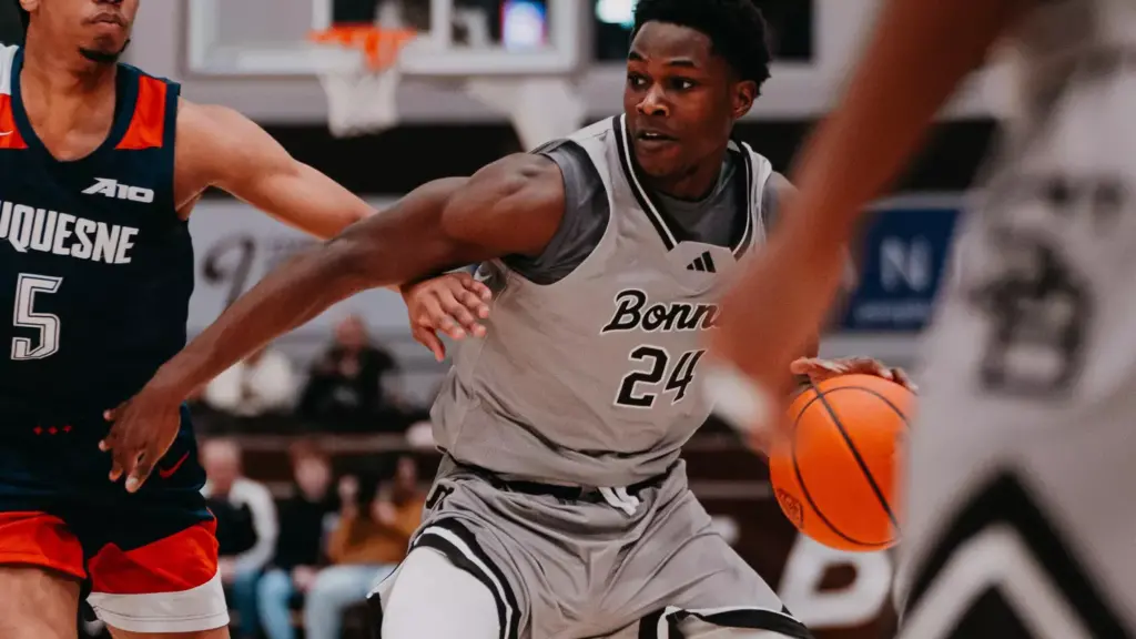 Mitchell, Charles power Bonnies to 94-76 rout of Rhode Island