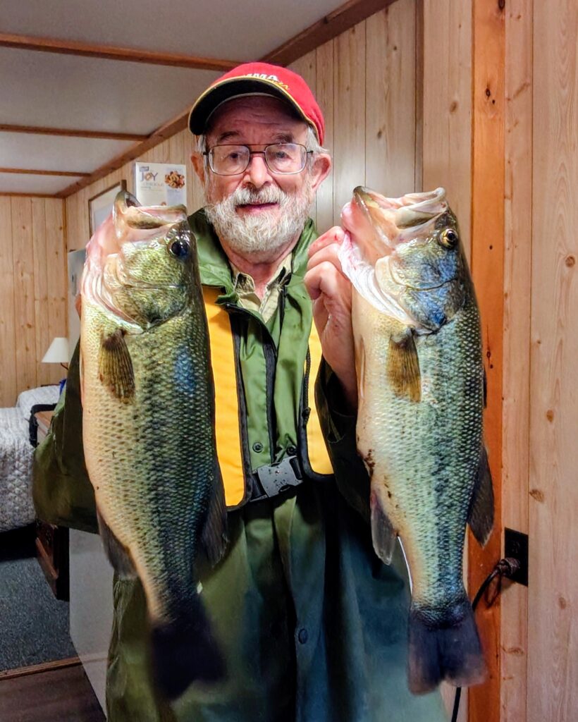 An early morning on a lake: 200 horsepower versus 4 - Olean Times Herald